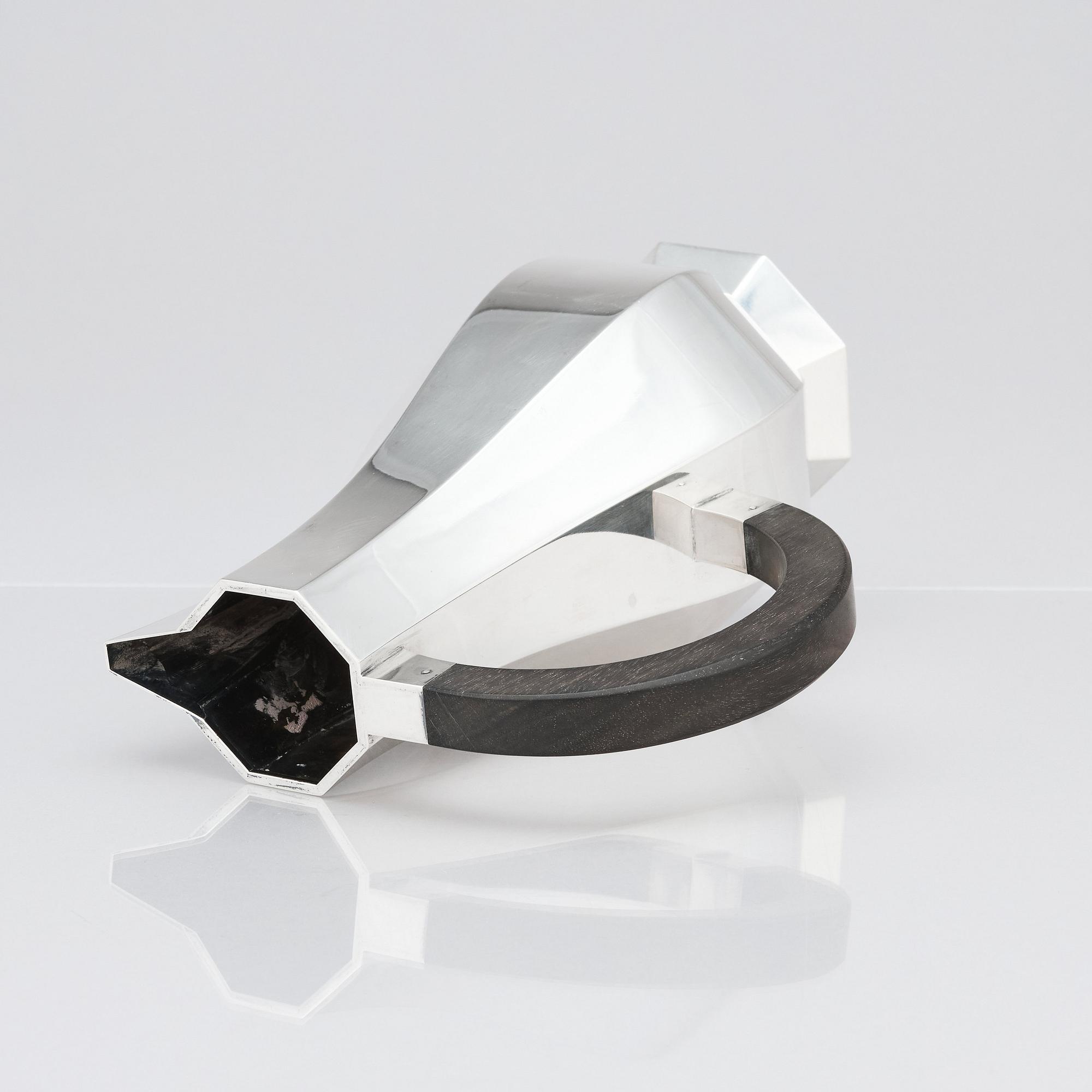 Wiwen Nilsson, a sterling silver pitcher, a 'hot water jug,' Lund, Sweden 1941.