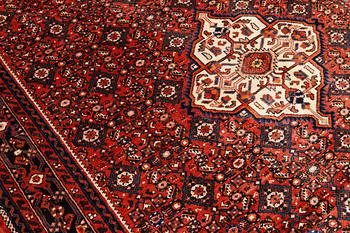 A carpet, Hosseinabad, approx. 320 x 210 cm.