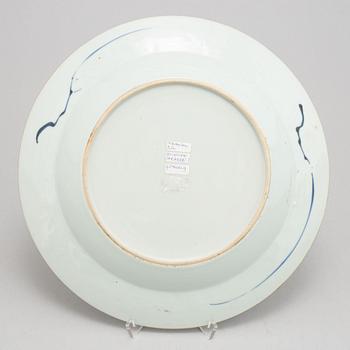 A blue and white plate, Qing dynasty, 18th Century.