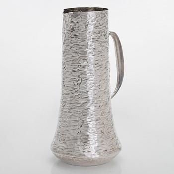 Tapio Wirkkala, a sterling silver pitcher with eight beakers, Hämeenlinna Finland 1973-1978.