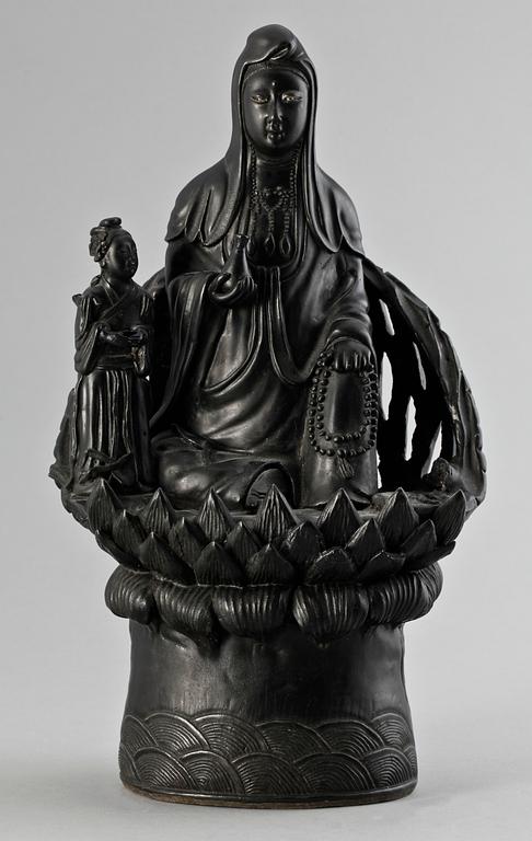 A black figure of Guanyin, Qing dynasty.
