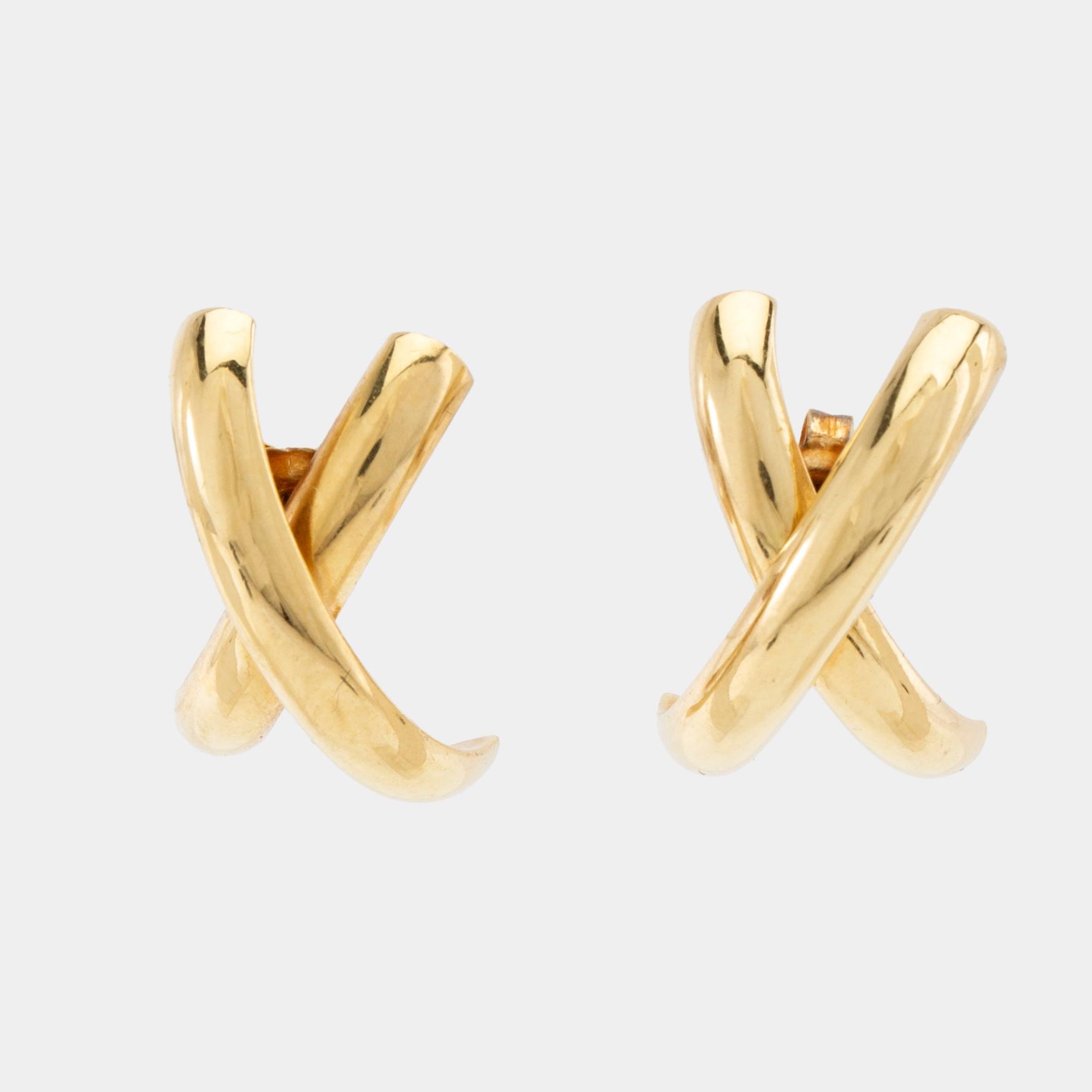 Örhängen ett par 18K guld.
