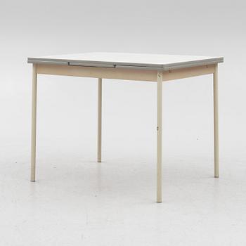 A table and four chairs, mid-20th Century.