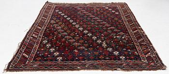 An antique Qashgai rug, 230 x 135 cm.