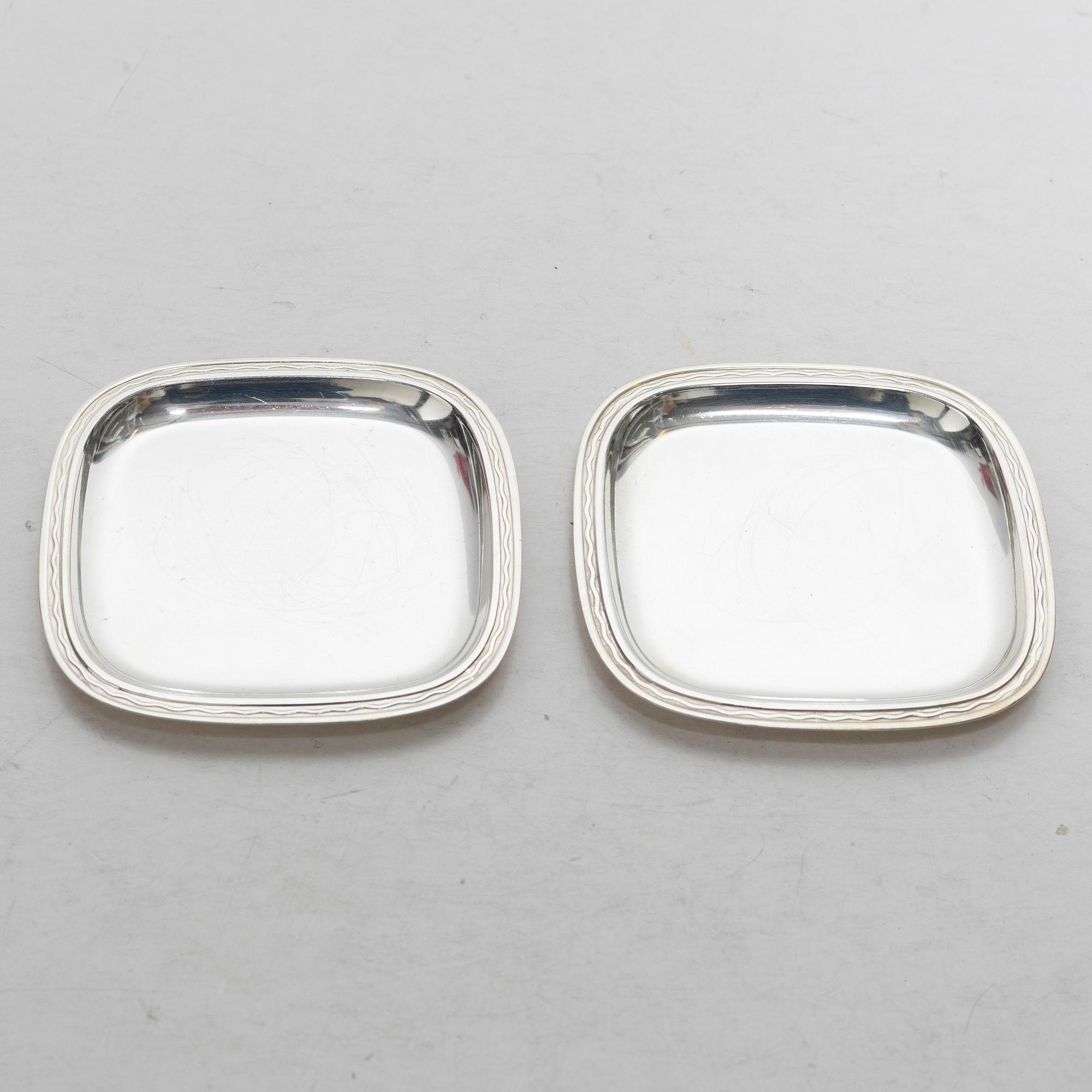 C.G. Hallberg, Coasters / ashtrays, 6 pcs, sterling silver, design by Gustaf Janson, Stockholm 1955-57.