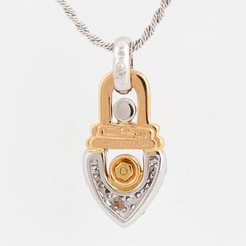 18K gold, diamond and most likey tourmaline necklace and earrings.