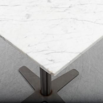 A marble top table, 21th century.
