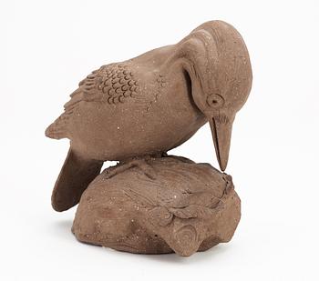 A Tyra Lundgren stoneware wood-pecker, signed with a seal.