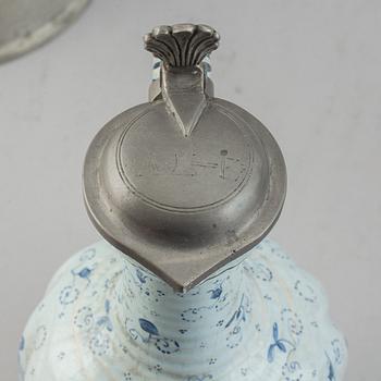 A group of three pewter and faience ewers, Holland/Germany, 18th/19th Century.