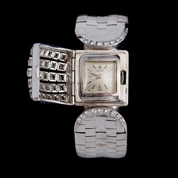 DAMUR, 18K vitguld, IWC, briljantslipade diamanter tot ca 1.50 ct. Tot vikt ca 81 g.
