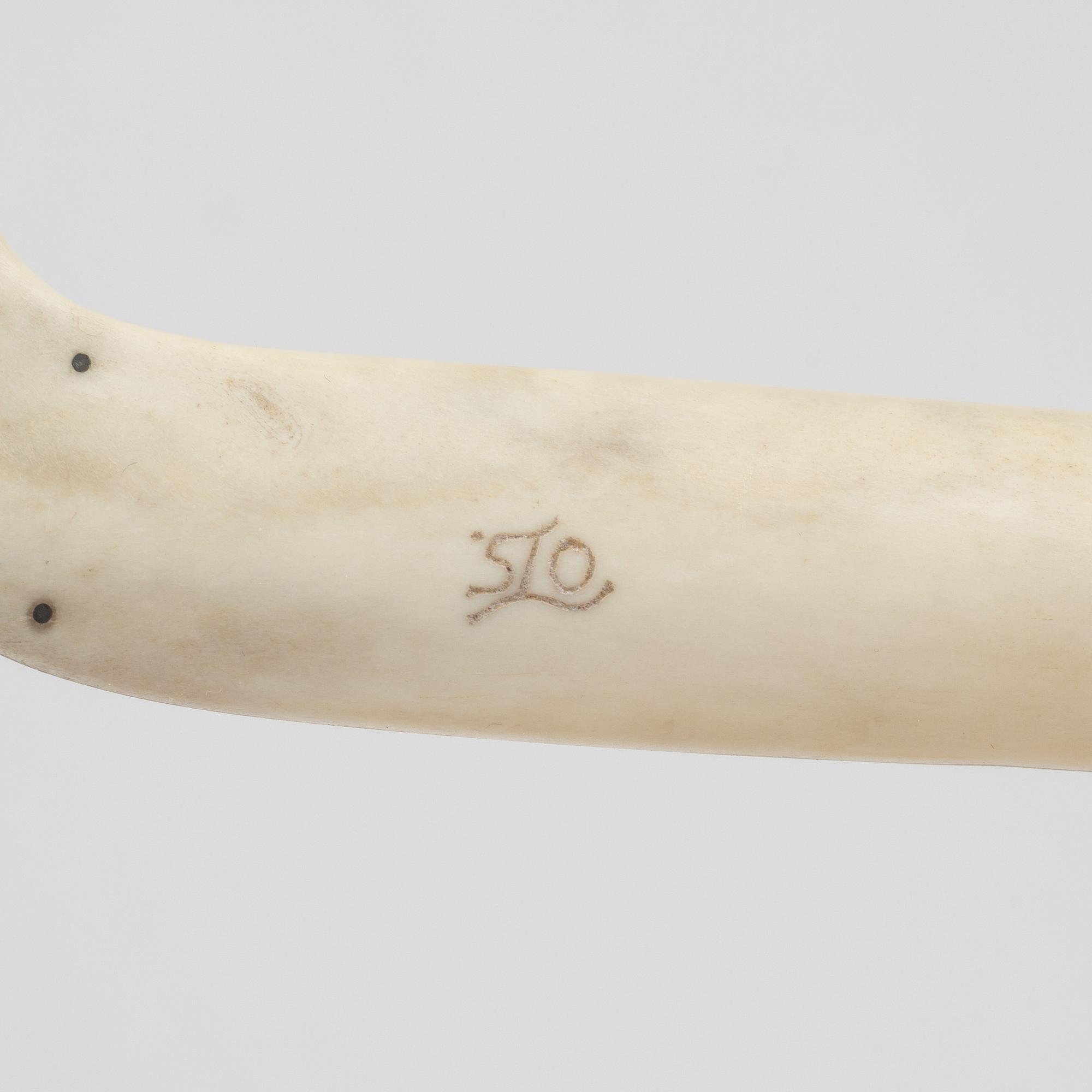 Olof Tomas Svonni, a reindeer horn knife, signed.