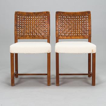 Carl Gustaf Hiort af Ornäs, a mid-20th Century dining table and eight chairs for  för HMN Huonekalu Mikko Nupponen.