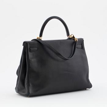HERMÈS, a black calf leather handbag, "Kelly 35".