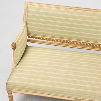 A late Gustaivan style sofa and four matched chairs from around the year 1900.