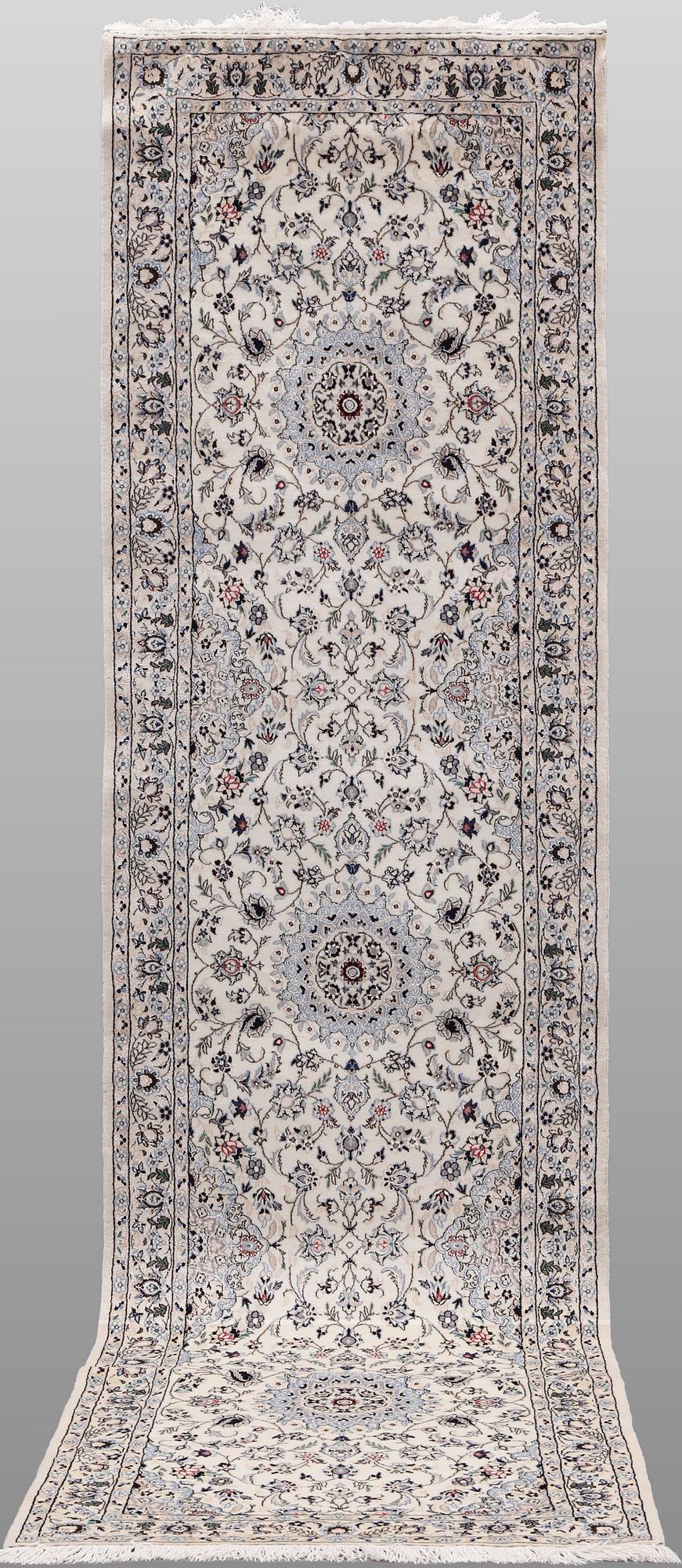A Nain part silk runner carpet, 342 x 81 cm.
