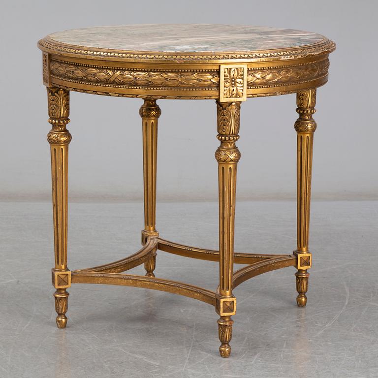 An early 20th century Louis XVI style table.