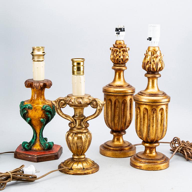 A set of four wood table lamps  from Paoletti, Firenze Italy, second half of 20th century.