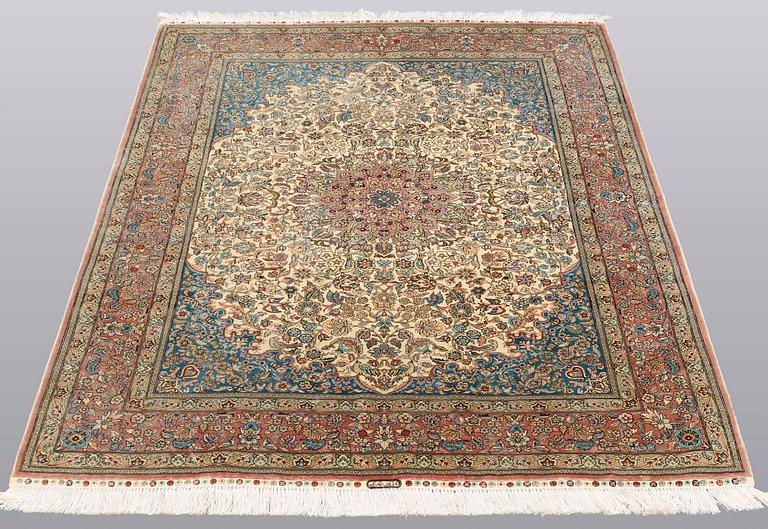 A rug, Figural Oriental silk,  signed, ca 175 x 125 cm.