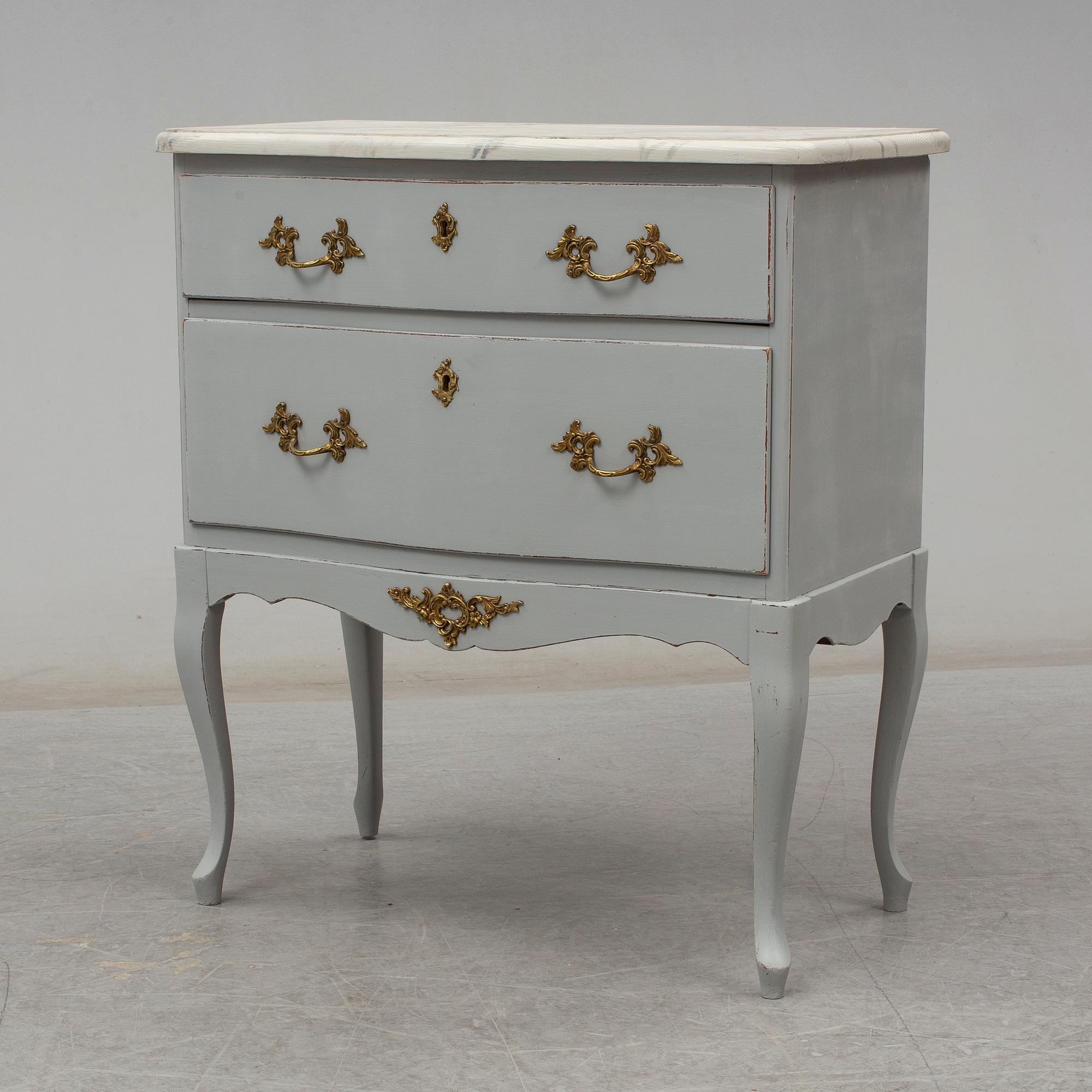 A Rococo style chest of drawers, second half of the 20th century.