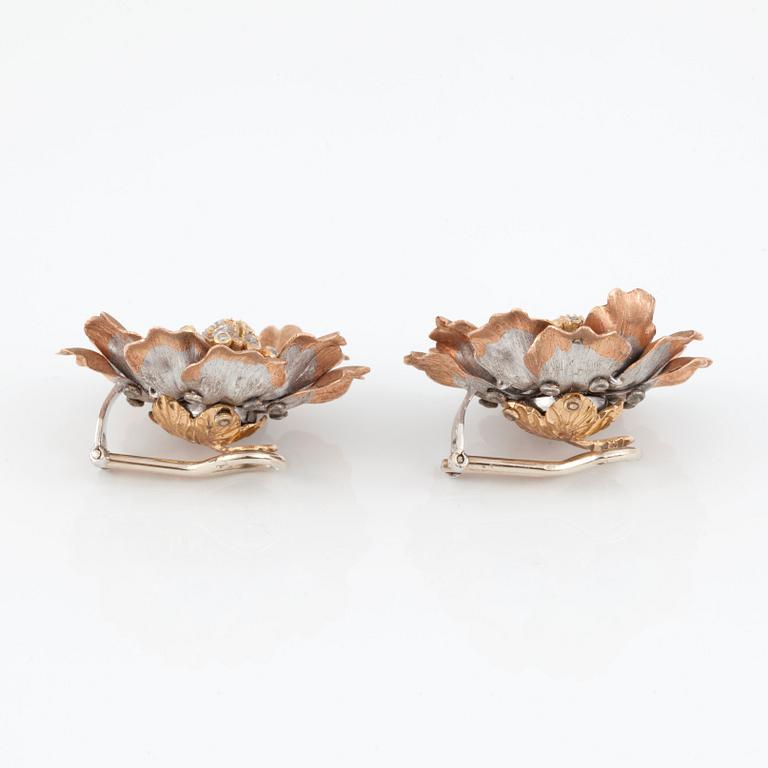 A pair of brilliant-cut diamond earrings by Gianmaria Buccellati for Lane Crawford in the shape of flowers.