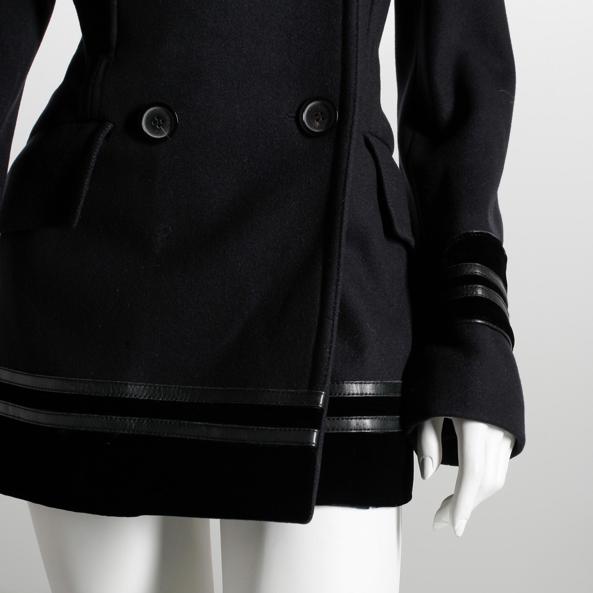 GUCCI, a black wool coat.