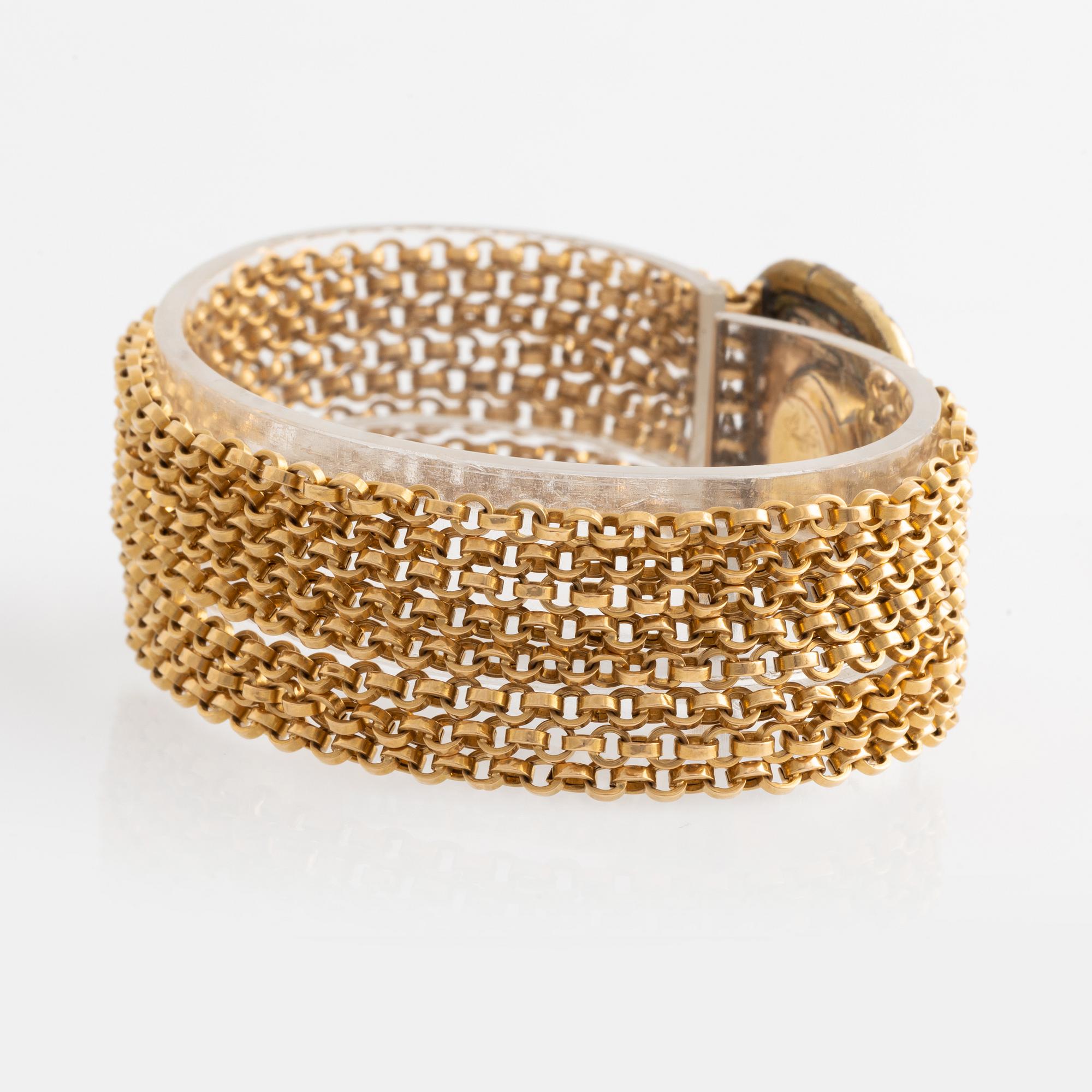 Armband 18K guld med pärlor, med hårgömma.