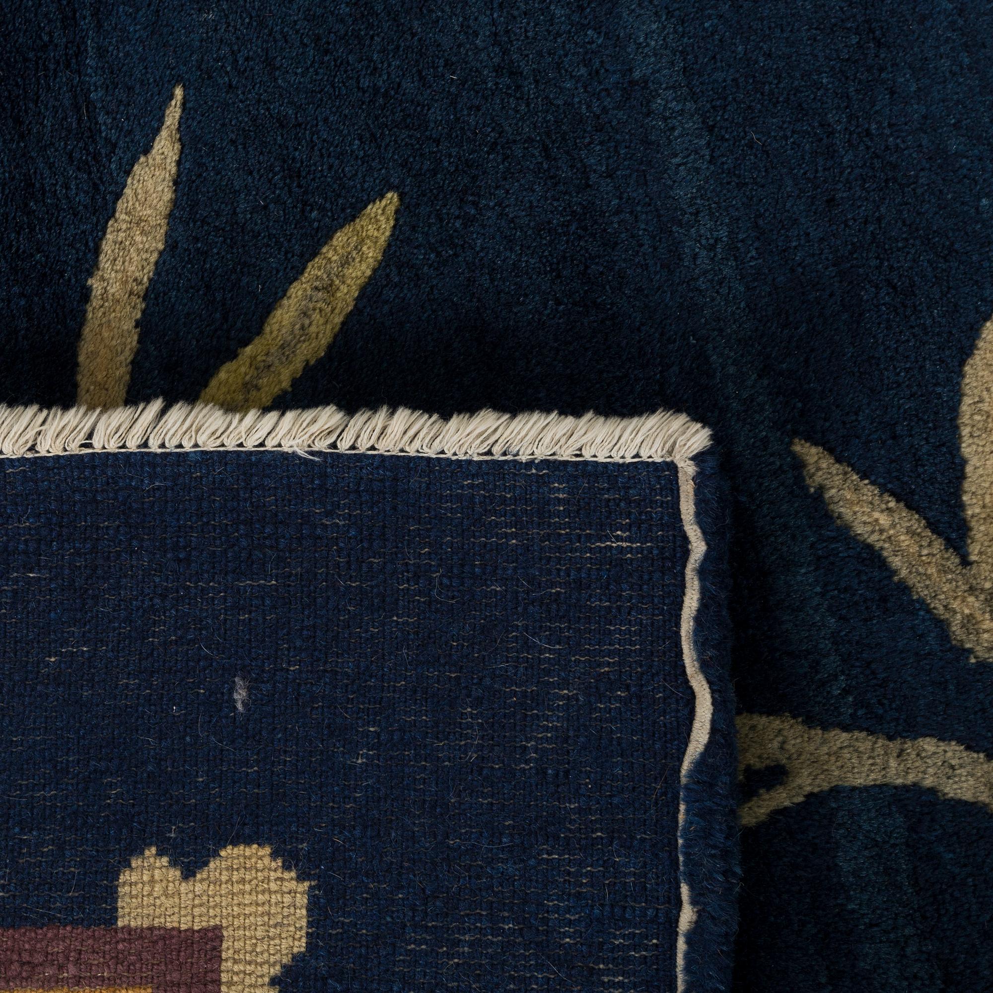 An old Chinese Baotou carpet ca 184 x 143 cm.