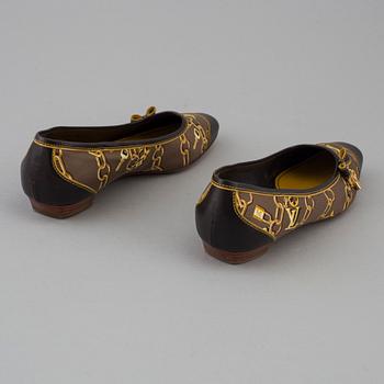 Ballerina shoes by Louis Vuitton.