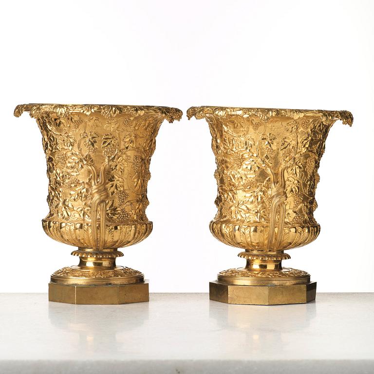 A pair of gilt bronze wine coolers, England, 1825-40.