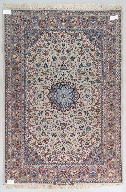 A semi-antique Isfahan rug, central Persia, signed c. 238 x 165 cm.