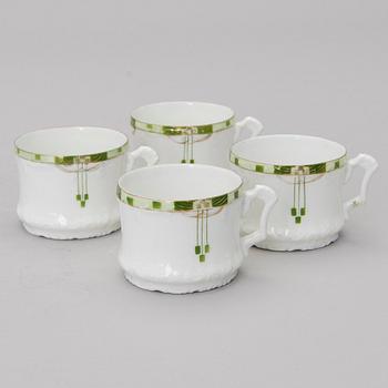 A set of four Kuznetsov porcelain coffee cups with saucers, export marked Fabrique Kousnetzoff, 1890-1913.