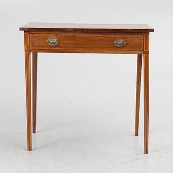 A table, England, circa 1900.