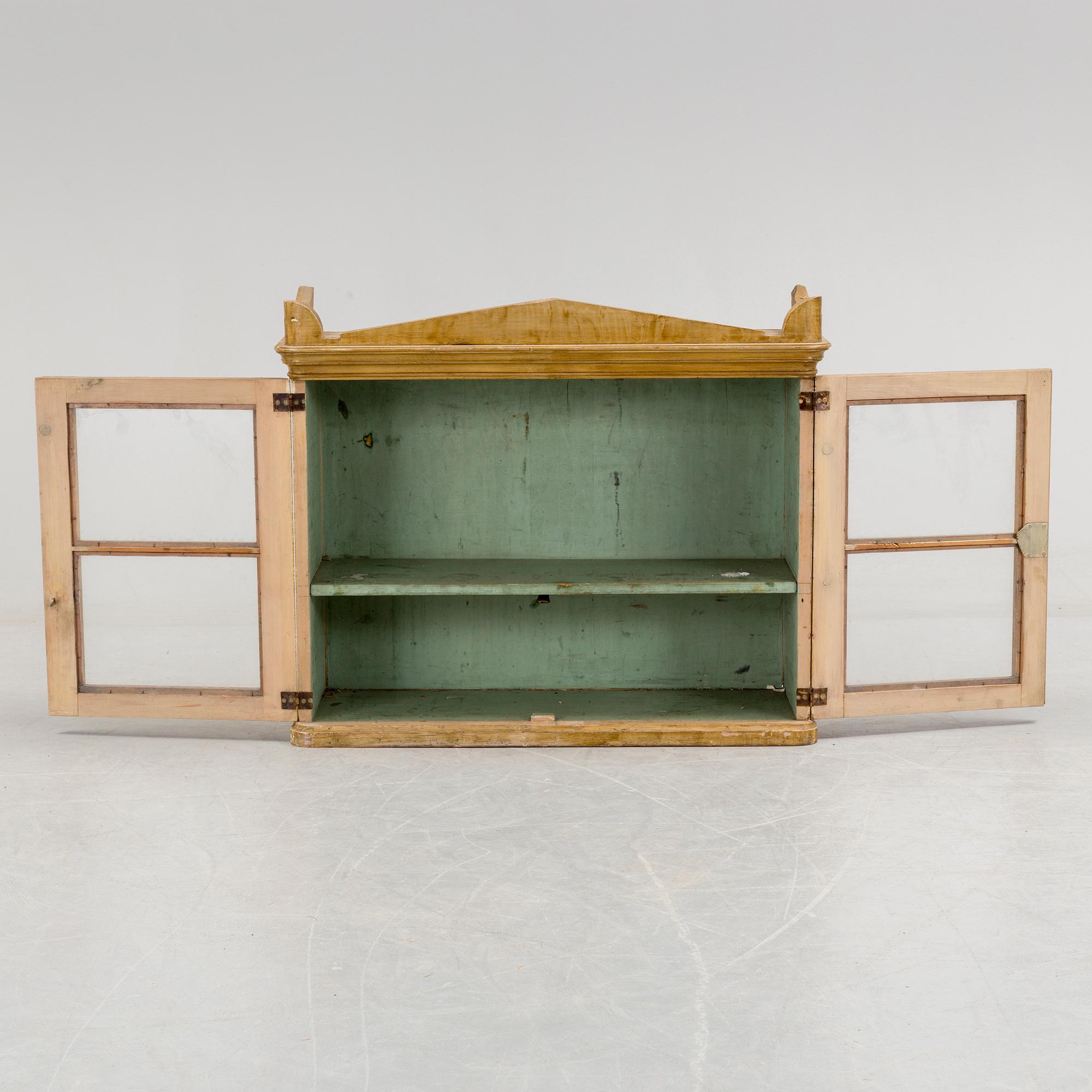 A DISPLAY CABINET, second half of the 19th century.