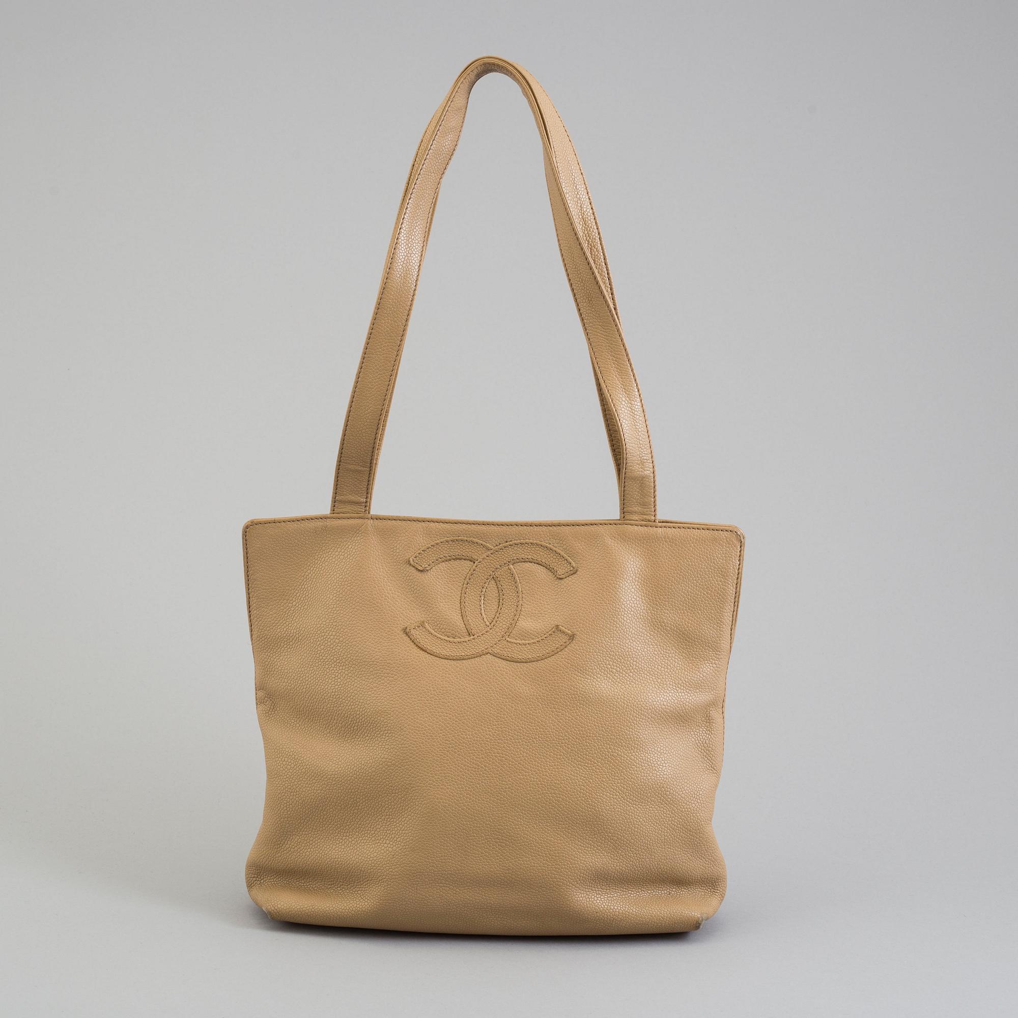 a CHANEL caviar leather bag.