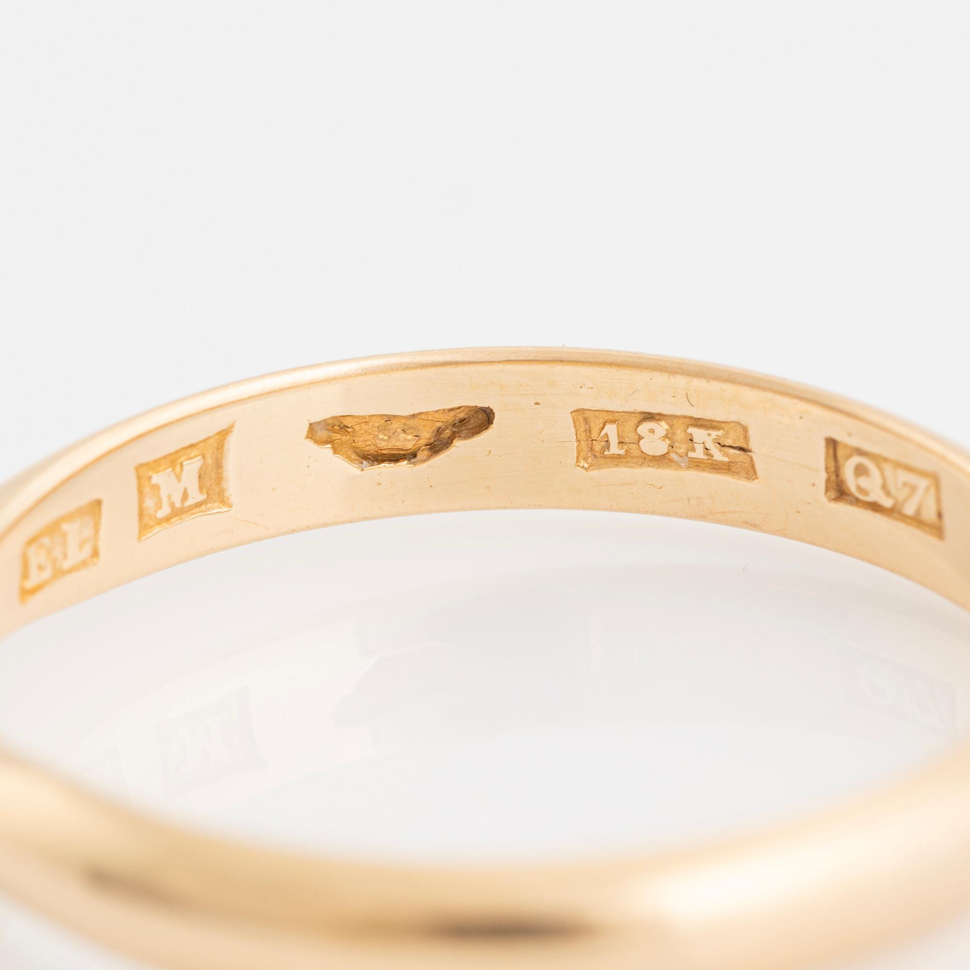 One-stone ring with an old-cut diamond.