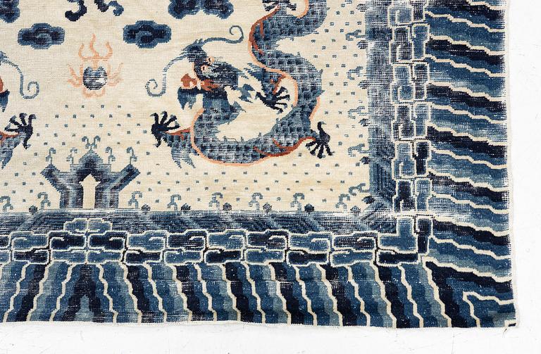 An antique Chinese ' five dragon rug', c. 280 x 190 cm.