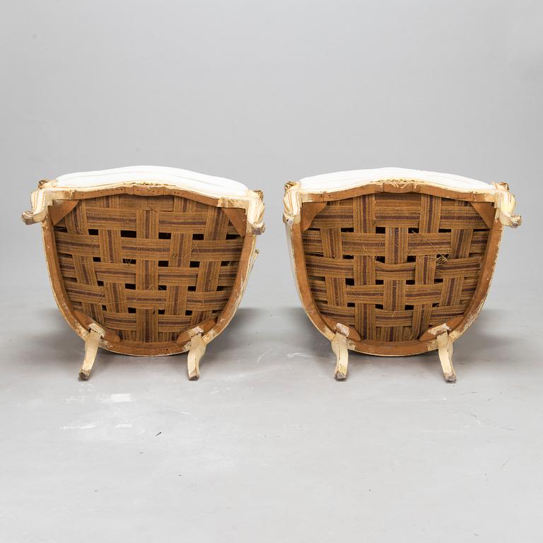A pair of louis quinze style bergerer armchairs, first part of the 20th century.