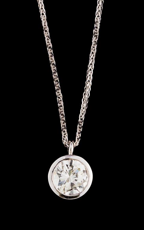 A gold and diamond pendant.