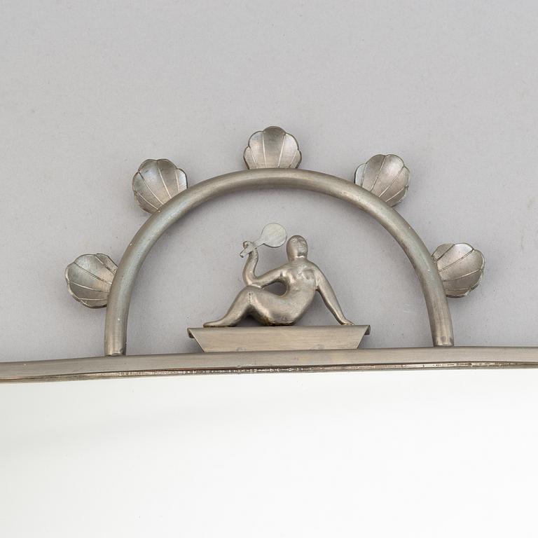 Two pewter wall sconces from Firma Svenskt Tenn, 1925.