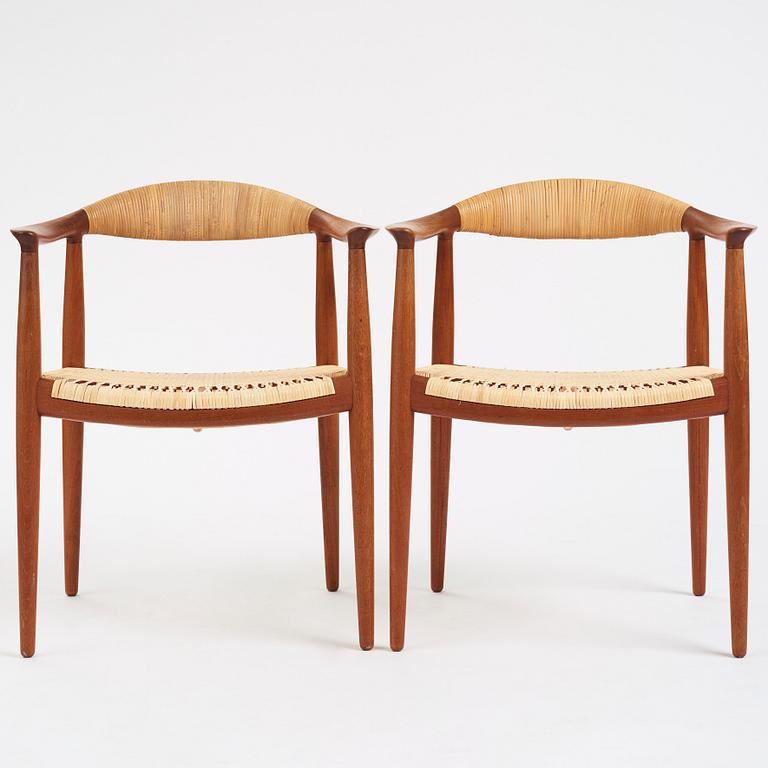 Hans J. Wegner, a pair of teak and rattan 'The Chair', JH-503, Johannes Hansen, Denmark 1950s.