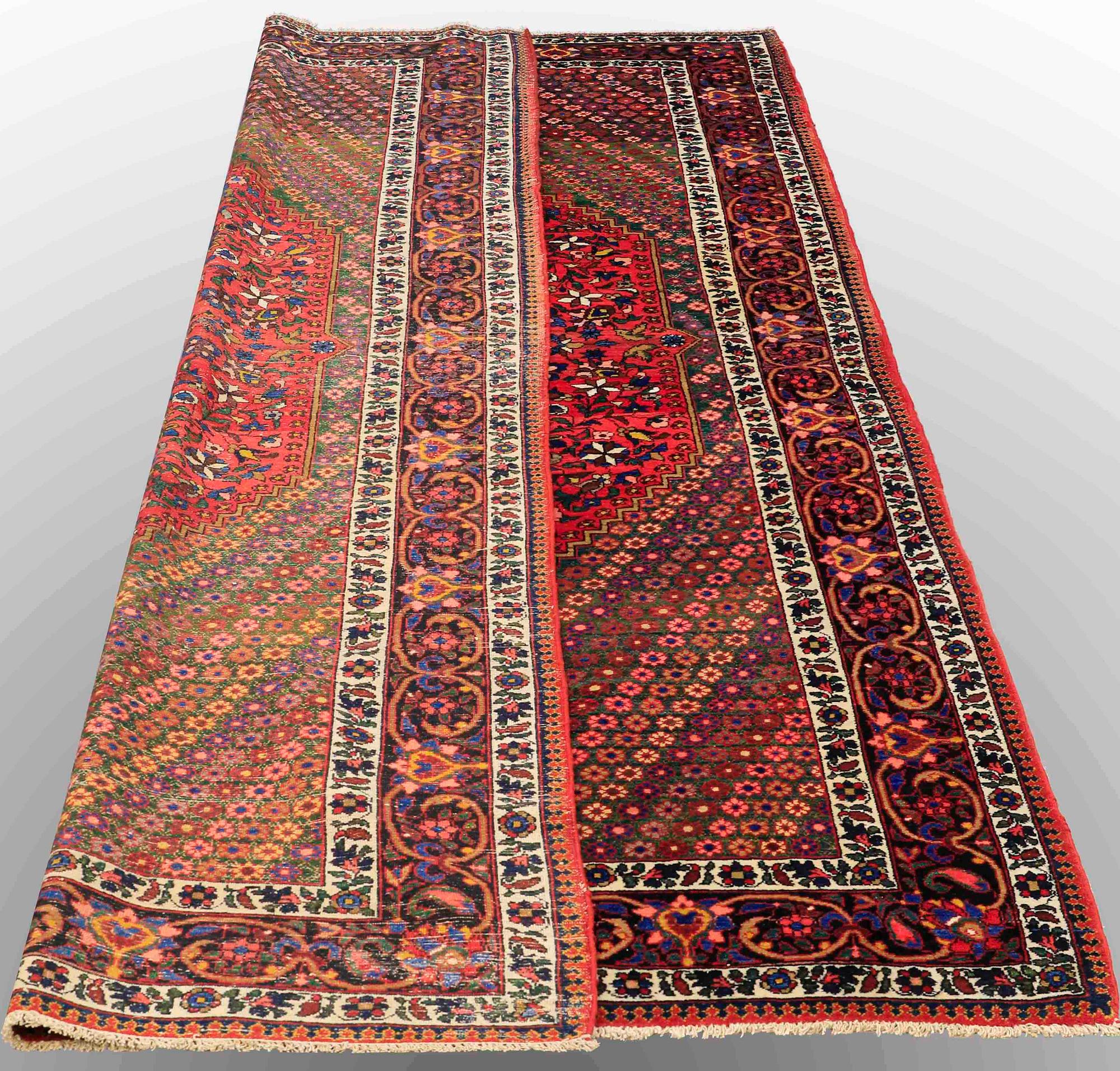 A carpet, Semi-antique Baktiari, ca 303 x 170 cm.