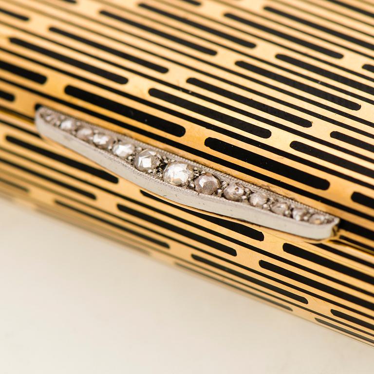 A CARTIER VANITY CASE, 18K gold, enamel, rose cut diamonds. 1930s.