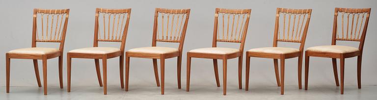 A set of six Josef Frank mahogany chairs by Svenskt Tenn, model 1165.