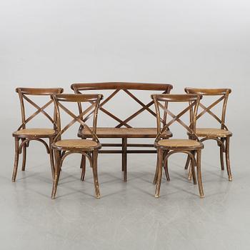 A wooden sofa, a table and four chairs, later part of the 20th century.