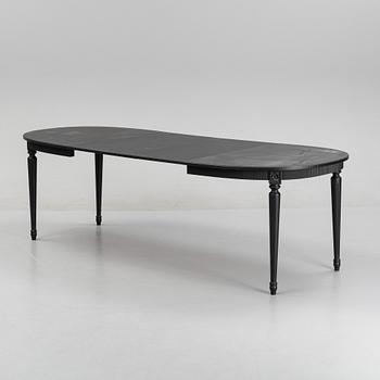 A Gustavians style dining table, second half of the 20th Century.