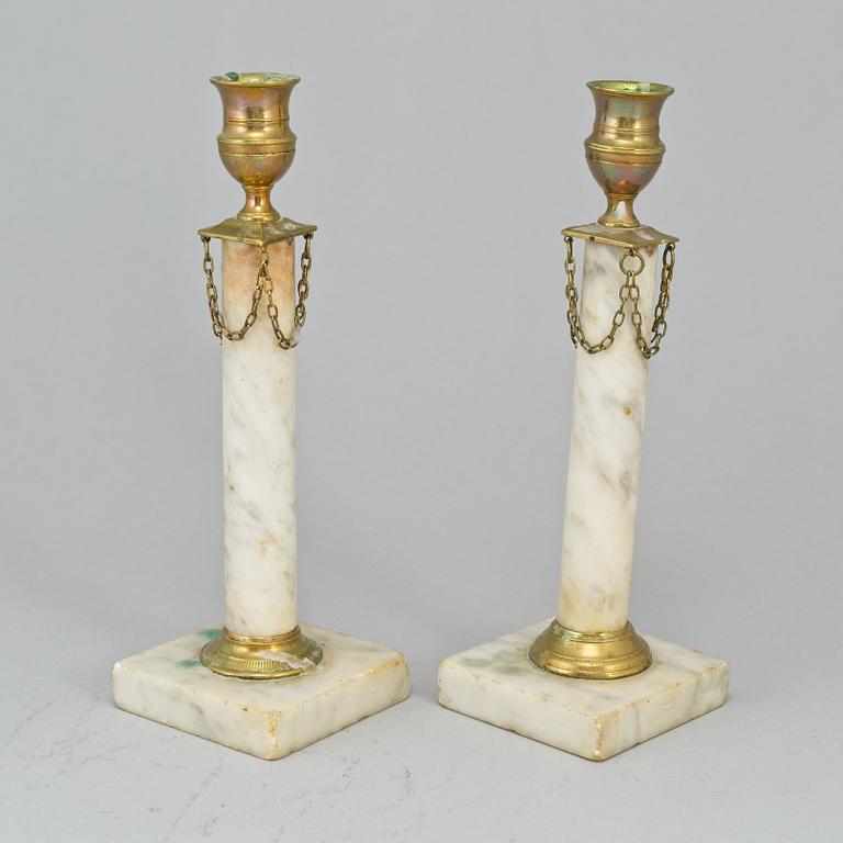 Two similar late gustavian  candlesticks, ca 1800.
