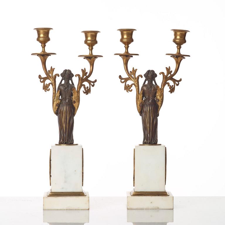 A pair of late Gustavian circa 1800 two-light candelabra.