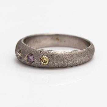 A palladium ring with diamonds ca. 0.25 ct in total.