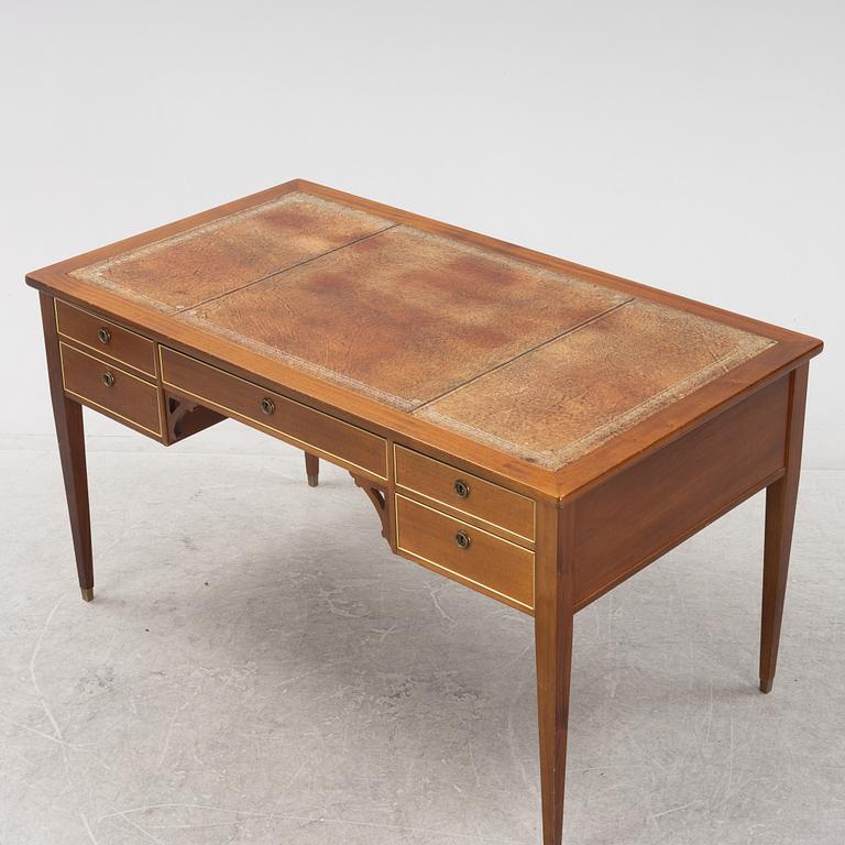 A Gustavian style writing desk and chair, 20th century.