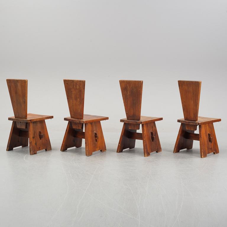 Four swedish 1930's pine chairs.